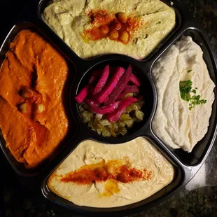 Family feast hummus and garlic