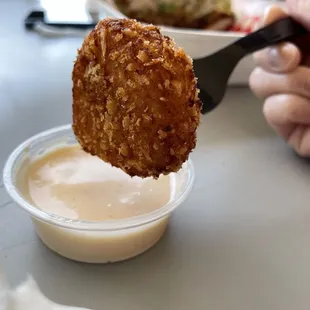 Potato Puffs with complimentary dipping sauce