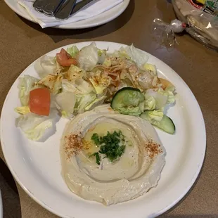 Hummus and salad (part of mixed plate). You can see the pita is from a grocery store..