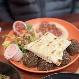 Falafel Plate- their falafel are full of flavor and soft from inside. Yum