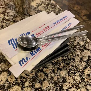 spoon and spoon rest on napkins