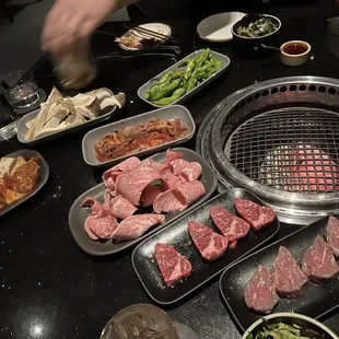 Ribeye, brisket, strip, bulgogi, octopus, mushrooms, shishito