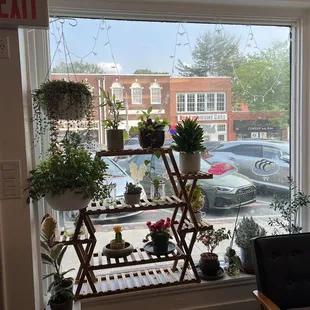 a view of a street through a window