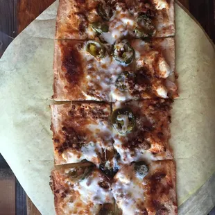 Rattlesnake pizza. This is my favorite item on the menu. It has jalapeños and chorizo. Yum!!