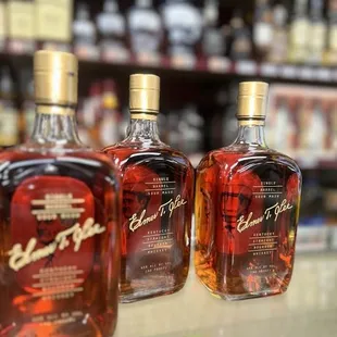 three bottles of whiskey on display