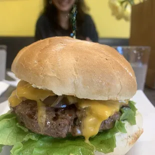 Cheeseburger and happy girlfriend