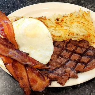Steak and Eggs Breakfast Hash Browns and a Side of Bacon