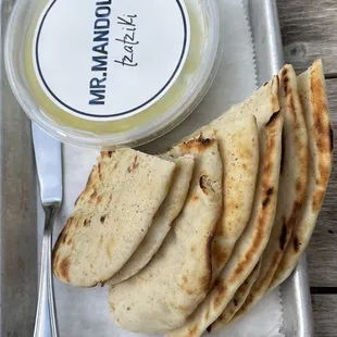 a plate of flatbreads and dip