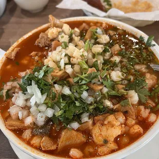 Menudo and chilaquiles with birria. Tortillas were not handmade...that was a downer.