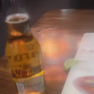 Beer brought &amp; lime on table....