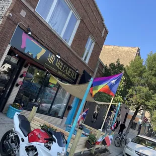  a motorcycle parked in front of a building