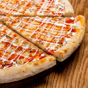 a closeup of a sliced pizza