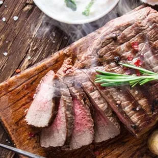 a steak on a cutting board