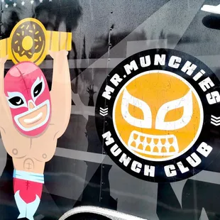 a man holding a doughnut