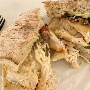 a chicken sandwich cut in half