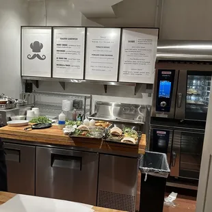 a chef preparing food in a commercial kitchen