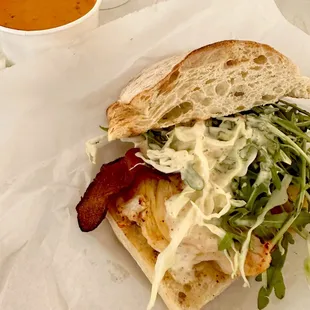 a sandwich with a side of soup