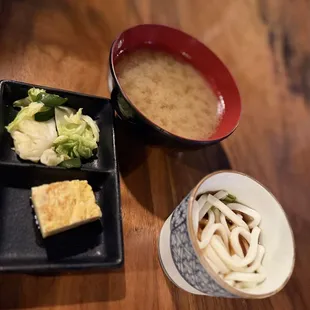 Soup, cold udon noodles, tamago and seasoned veggies (included in meal)