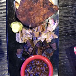 Ribs, pulled pork, and burnt ends with BBQ beans