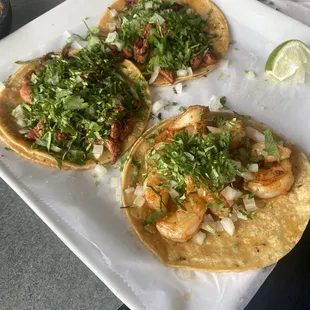 Al Pastor tacos (corn tortillas, pork, onion, cilantro and pineapple)