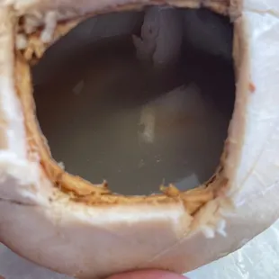 The coconut is sour and spoiled