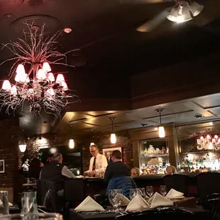 The bar that was quickly filling with patrons