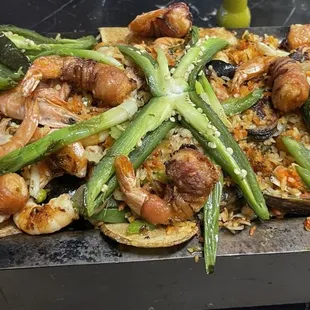 Delicious  paella with wrapped shrimp