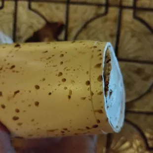 a person holding a banana