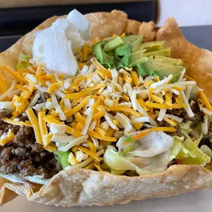 Taco salad (no ): ground beef/lettuce/cheese/sour cream/cucumbers/avocado