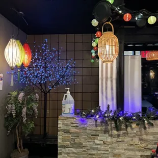 the interior of a restaurant decorated for christmas