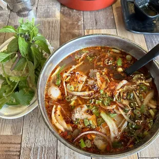 13. Mr. Pho special noodle soup pork broth. Excellent!