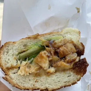 a chicken sandwich with pickles