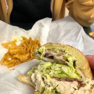 Half of a 13- bacon, chicken, lettuce, tomatoes, avocado on toasted sourdough ... SO Good