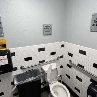 a toilet in a public restroom