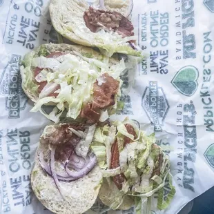 1 piece of broken up bacon on entire BLT.