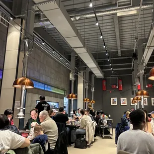 a large group of people eating