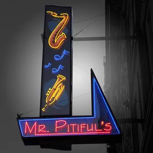 a neon sign for a restaurant