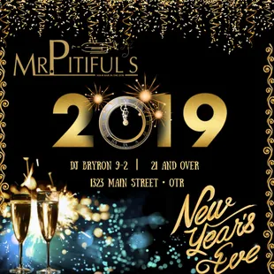 two champagne glasses and a clock