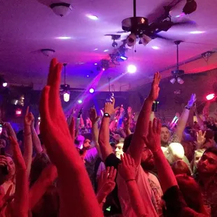 a crowd of people at a nightclub