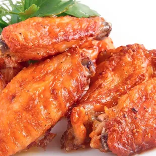 a plate of chicken wings