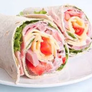 a ham and cheese wrap on a plate
