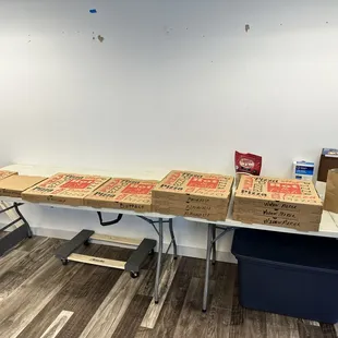 pizza boxes on a table