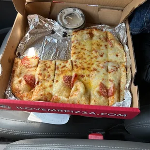 Cheese bread with pepperoni added.