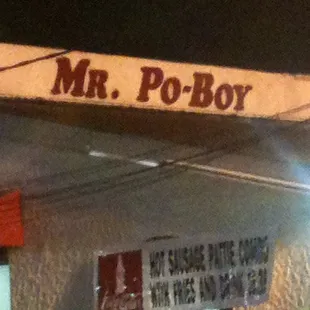 a restaurant with a sign that says mr po - boy