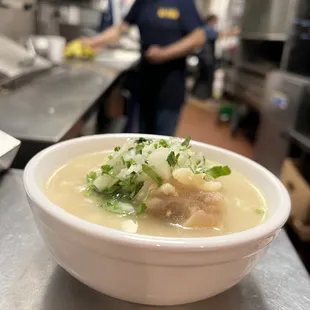 a bowl of soup in a commercial kitchen