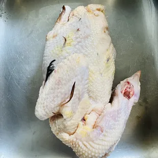 Chicken that's not clean and feather still all over the chicken ughhh