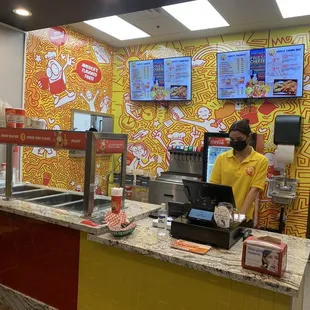 Front of the store when you enter.