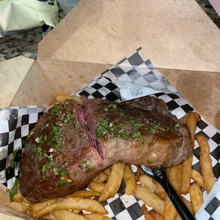 a steak and french fries