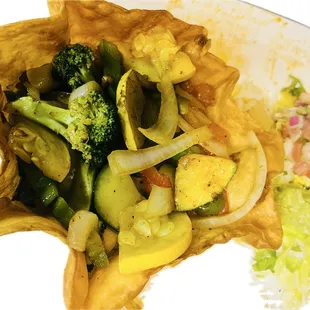 Veggie bowl with guacamole salad on the side