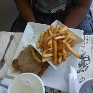 Chicken fried steak with fries